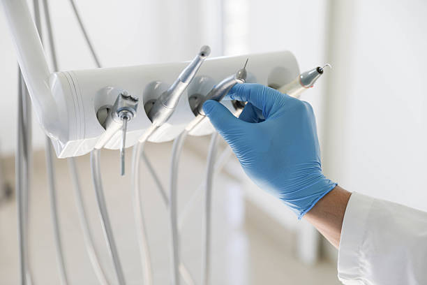 Professional Tooth Extraction technician working in Vista Center, NJ